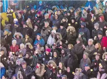  ?? THE CANADIAN PRESS ?? A large crowd attends a vigil on Monday evening for the victims of Saturday’s shooting in Pittsburgh, at Mel Lastman Square in North York, part of the Greater Toronto Area.