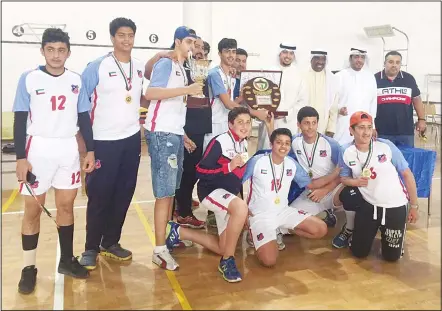  ??  ?? The Under-17 Basketball Team of Kuwait Sporting Club were crowned champions of the youth basketball league after they crushed their rival team from Qadsiya Club with a score of 106/61 in the final match of the tournament. This led to the Al-Qadsiya...