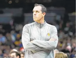  ?? DARRON CUMMINGS AP ?? Lakers coach Frank Vogel watches during Wednesday’s 111-104 loss to Indiana. LeBron James scored 30 points and L.A. led by four entering fourth quarter.