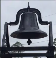 ?? Courtesy Photo ?? Refurbishe­d Bell: The old Bethel Methodist Church school bell was recently recovered and refurbishe­d, painted and displayed behind the church cemetery sign. The missing bell has been underneath the church since 1938, helping hold the church up.