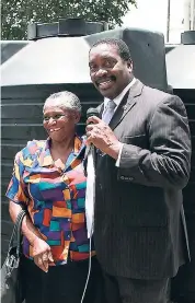  ?? PHOTO BY ORANTES MOORE ?? Mary Sewell of Derry Basic School in St Mary accepts a 600-gallon water storage tank from Member of Parliament for St Mary Western Robert Montague.