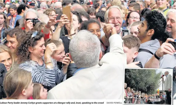  ??  ?? Labour Party leader Jeremy Corbyn greets supporters at a Bangor rally and, inset, speaking to the crowd