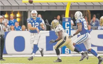  ?? | AP FILE ?? Lucas Oil Stadium in Indianapol­is has field-level suites in one end zone (background).