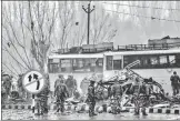  ?? PTI FILE ?? ■
Security personnel carry out rescue and relief work at the site of a suicide bomb attack at Lathepora Awantipora in Pulwama district of south Kashmir on February 14, 2019.