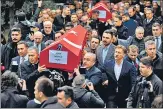  ?? AFP ?? People carry coffins of Yagmur Ucar and Arzu Ozsoy during funeral ceremonies in Istanbul.