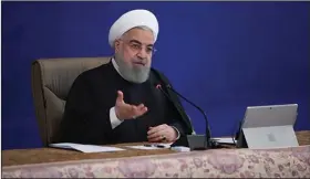  ?? (AP/Iranian Presidency Office) ?? Iranian President Hassan Rouhani speaks in a Cabinet meeting Wednesday in Tehran about his rejection of a bill by parliament that would have suspended U.N. inspection­s and boosted uranium enrichment.