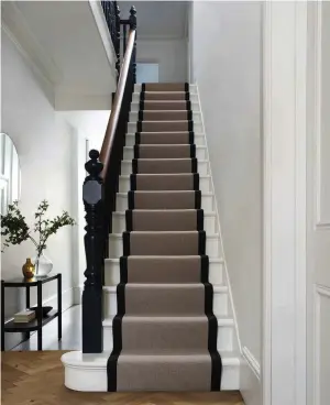  ?? ?? Wool runners are chic and stylish with natural in-built resilience in the fibres, making them perfect for high traffic areas such as the stairs
Pimlico stair runner in Madeira, from £30 per sq m, Cormar Carpets