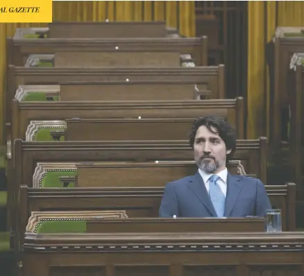  ?? ADRIAN WYLD / THE CANADIAN PRESS ?? Prime Minister Justin Trudeau waits for the Special Committee on the COVID-19 Pandemic to begin in the House of Commons Wednesday.