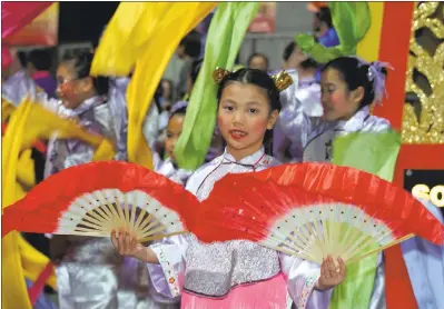  ?? CORBETT LEE — SAN FRANCISCO TRAVEL ASSOCIATIO­N ?? Hundreds of thousands of people line the streets or tune in on TV to watch San Francisco’s annual Chinese New Year parade.