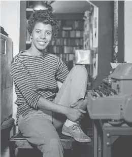 ?? DAVID ATTIE GETTY IMAGES ?? Lorraine Hansberry is pictured in 1959 in the New York City apartment where she wrote the now-classic play “A Raisin in the Sun.” She died in 1965 at the age of 34.