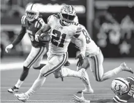  ?? Brandon Wade/associated Press ?? Ezekiel Elliott and the Cowboys may not catch the Eagles in the NFC East. But Dallas has establishe­d itself as a clear Super Bowl contender.