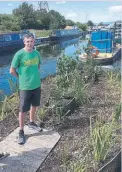  ?? PHOTO: RICHARD MILLAR ?? Iain Withers, creative producer of the Floating Gardens, on board one of the gardens.