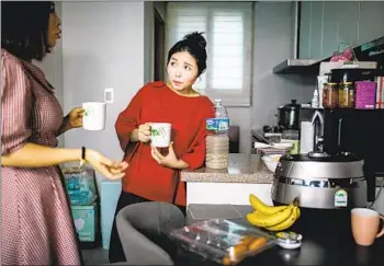  ?? Photograph­s by Marcus Yam Los Angeles Times ?? YOON SEOL MI, right, talks to fellow North Korean refugee Seok Hyeon Ju at her home in South Korea.