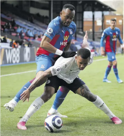  ?? (Photo: AFP) ?? Crystal Palace’s French-born Ghanaian striker Jordan Ayew (left) vies with Manchester City’s Brazilian striker Gabriel Jesus during the English Premier League match at Selhurst Park in south London yesterday.