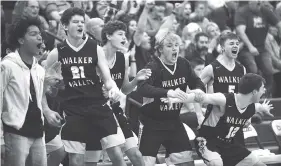  ?? STAFF PHOTO BY ANGELA LEWIS FOSTER ?? Walker Valley players celebrate a late goal during the region 3-AAA game against Cleveland on Tuesday at Cleveland High School. Walker Valley won 58-51.