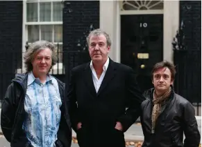  ?? (Suzanne Plunkett/Reuters) ?? FORMER ‘ TOP GEAR’ presenters James May (left), Jeremy Clarkson (center) and Richard Hammond pose outside 10 Downing Street in London in 2011.