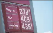  ?? DAVID ZALUBOWSKI — THE ASSOCIATED PRESS FILE ?? Gas pump prices are posted on a sign at a Conoco station in southeast Denver.