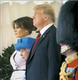  ?? Doug Mills/The New York Times ?? Queen Elizabeth II is flanked by President Donald Trump and first lady Melania Trump on Friday at Windsor Castle in Windsor, England.