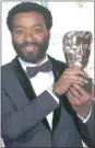  ??  ?? SILVERWARE: Chiwetel Ejiofor wins the best actor trophy for his role as Solomon Northup in 12 Years A Slave.