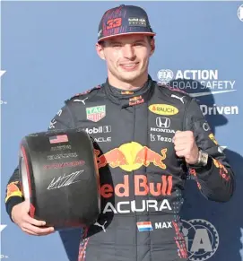  ?? MARK THOMPSON/AGENCE FRANCE-PRESSE ?? MAX Verstappen beams with pride.