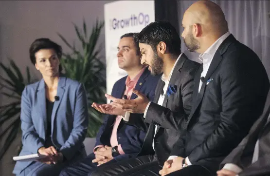  ?? TYLER ANDERSON ?? Navdeep Dhaliwal of Supreme Cannabis, second from right, speaks about the global pot economy in Toronto in June. Dhaliwal’s company is betting on growth in Lesotho.
