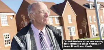  ??  ?? Cllr Phil Davison at the new housing developmen­t on Broad Avenue, off Jenny Broad Lane, Hessle