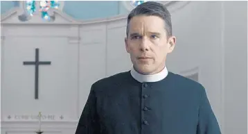  ?? COURTESY OF A24 ?? A pastor (Ethan Hawke) finds his faith tested by a troubled parishoner and his own demons in “First Reformed.”