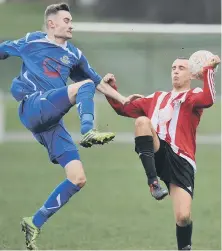  ??  ?? West End (red) battle in Saturday’s shock loss to visitors Wolviston