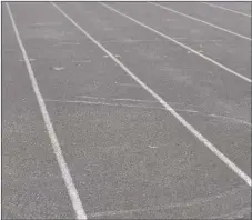  ?? JEANS PINEDA/Taos News ?? An S pattern that appears on the Taos Tigers track. It’s the result of a child riding a bicycle on the track during the curing process.