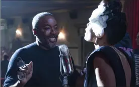  ?? TAKASHI SEIDA — HULU VIA THE ASSOCIATED PRESS ?? This image released by Hulu shows director Lee Daniels, left, with Andra Day on the set of “The United States vs. Billie Holiday.”