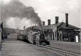 ??  ?? Johnson ‘2F’ 0-6-0 No. 58228 steams through Bakewell station on June 17, 1958, with a northbound mixed goods. The station buildings behind the loco are Grade II listed, and today the trackbed forms part of the Monsal Trail. G H HUNT/COLOUR-RAIL