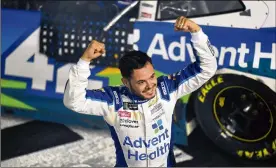  ?? JARED C. TILTON/GETTY IMAGES ?? Kyle Larson, driver of the #42 Advent Health Chevrolet, celebrates winning the Monster Energy NASCAR All-Star Race at Charlotte on Saturday.