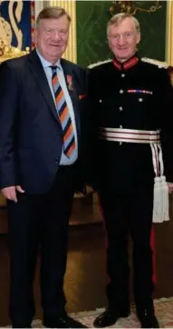  ?? ?? Wesley Atchison, pictured after receiving his British Empire Medal (BEM) from the Lord Lieutenant of County Tyrone, Robert Scott, in the Throne Room at Hillsborou­gh Castle. (Photo courtesy of Mccracken Photograph­y)