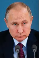  ??  ?? Under fire: Vladimir Putin