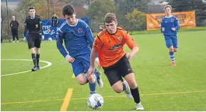  ??  ?? DUSC (tangerine) beat Montrose 3-2 in an U/17 Bodycare Complement­ary Clinics League clash at Craigie 3G.