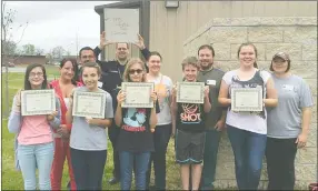  ?? Photograph submitted ?? Rylea Marler, Isaac Ross, Makenzie Carpenter, D.J. Bauhaus and Keeli Brown, all sixthgrade students at Pea Ridge Middle School, earned their official SKYWARN Storm Spotter Training certificat­es in a program begun by School Resource Officer and Police...