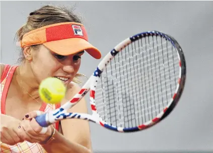  ?? PHOTO: REUTERS ?? Stars and stripes . . . Sofia Kenin, of the United States, in action during her French Open second round match against Romania’s Ana Bogdan at Roland Garros in Paris yesterday.