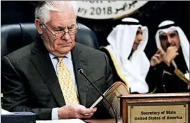  ?? JON GAMBRELL/AP ?? Secretary of State Rex Tillerson prepares for a meeting Tuesday in Kuwait City. Tillerson emphasized the need to finish off the Islamic State, also called ISIS, in Syria.