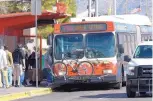  ?? GREG SORBER/JOURNAL ?? Passengers board a Rapid Ride bus near San Mateo and Central Avenue last month. The proposed Albuquerqu­e Rapid Transit project would replace some of the Rapid Ride routes — the ones running almost exclusivel­y on Central — to avoid duplicatio­n.