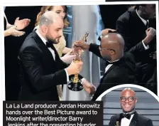  ??  ?? La La Land producer Jordan Horowitz hands over the Best Picture award to Moonlight writer/director Barry Jenkins after the presenting blunder at the 2017 Academy Awards, above, and Barry with the trophy, right