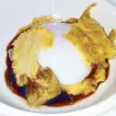  ??  ?? 62- degree egg with foie gras, porcini, mashed potato, port wine jus and puff pastry crumbs.