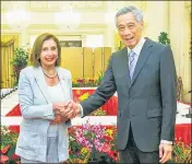  ?? AFP ?? Singapore’s PM Lee Hsien Loong (right) with US Speaker of the House Nancy Pelosi in Singapore on Monday.