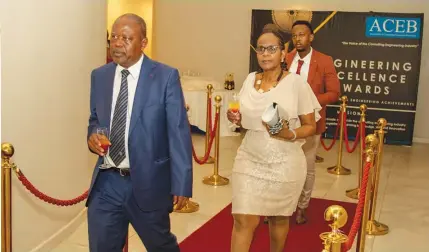  ?? ?? RED CARPET:- Eng. Victor Ponoesele (front) and his wife were part of the delegation that attended the ACEB Awards at Phakalane Golf Estate Resort And Convention Center