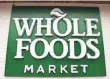  ?? SAUL LOEB, AFP/GETTY IMAGES ?? Amazon began cutting prices at Whole Foods on Monday, its first day as new owner of the grocery chain.