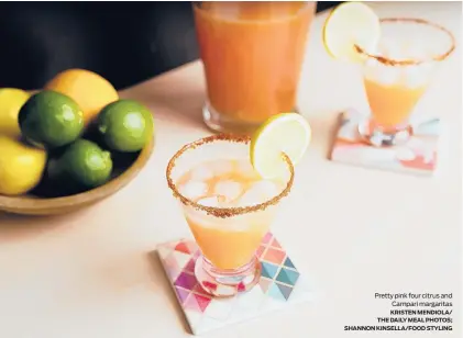  ?? KRISTEN MENDIOLA/ THE DAILY MEAL PHOTOS; SHANNON KINSELLA/FOOD STYLING ?? Pretty pink four citrus and Campari margaritas