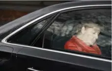  ?? ODD ANDERSEN/AFP/GETTY IMAGES ?? German Chancellor Angela Merkel leaves a meeting with German President Frank-Walter Steinmeier Monday after coalition talks failed.