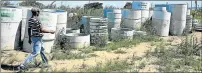  ??  ?? DELIVERY PROBLEM: A file photo shows piles of material meant for bulk water and sanitation in Mdantsane’s Gqozo village in NU1