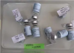  ?? Tribune News Service/getty Images ?? Empty vials that contained a dose of the Johnson & Johnson vaccine against the COVID-19 coronaviru­s lie on a table as South Africa proceeds with its inoculatio­n campaign at the Klerksdorp Hospital on February 18.