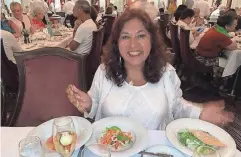  ?? PROVIDED BY NARGIS KHERAJ ?? Nargis Kheraj, from New Brunswick, Canada, is an avid cruiser. Here, she enjoys a meal on a cruise in 2019.