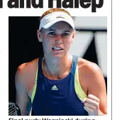  ?? REX ?? Final push: Wozniacki during her victory over Mertens